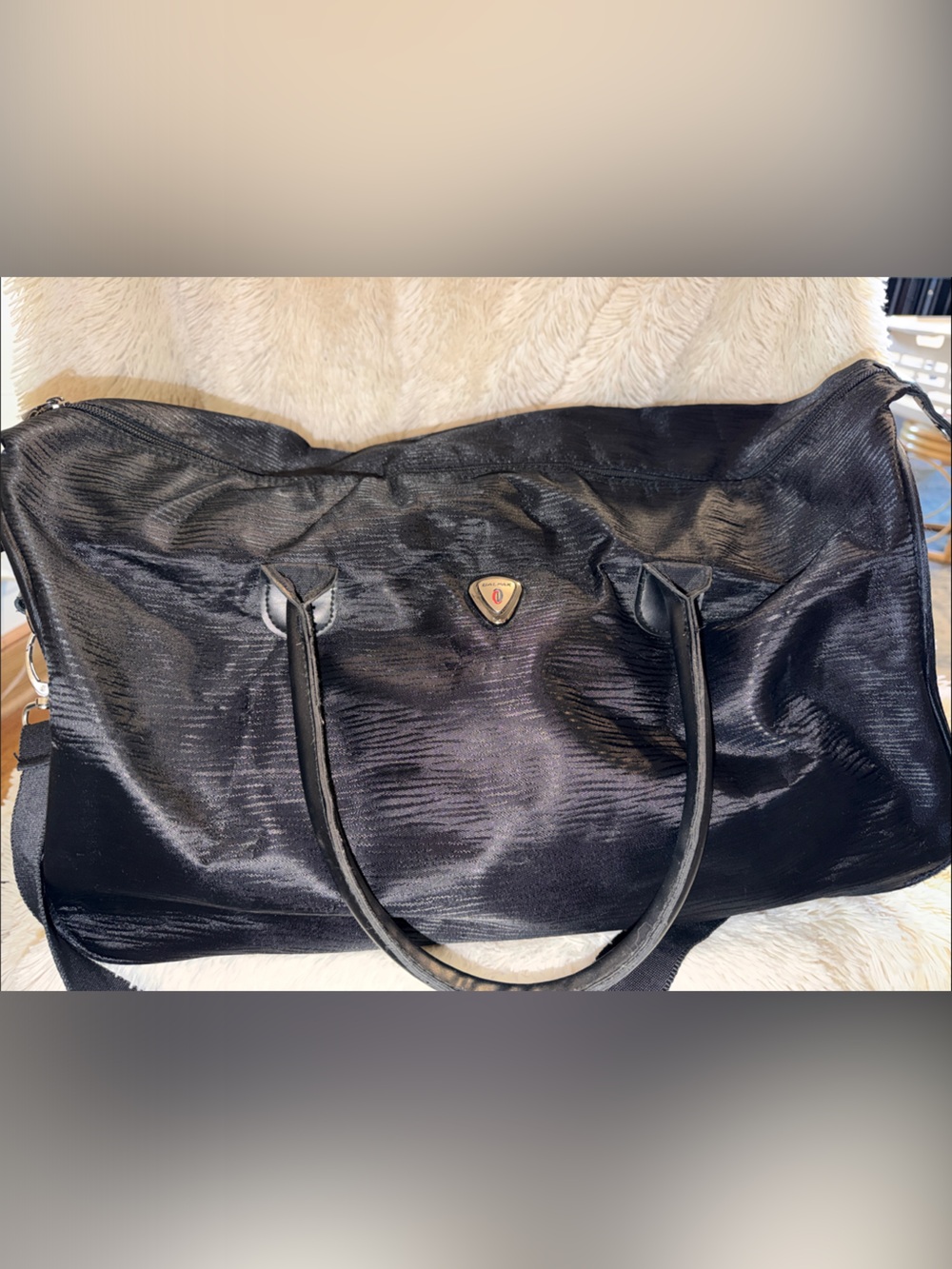 Black Calpak Women's Duffel Bag with adjustable strap